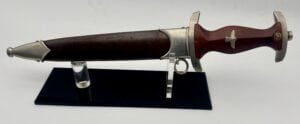 Gebr. Heller SA dagger with accompanying brown scabbard