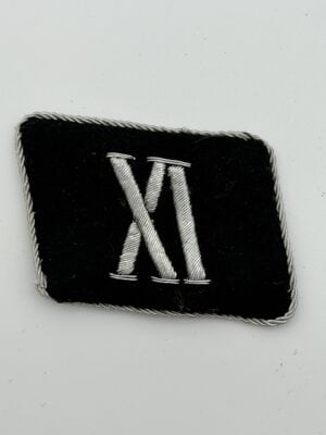 SS Collar Tab with Roman Numeral “XI” – Waffen-SS Unit Identification Tab