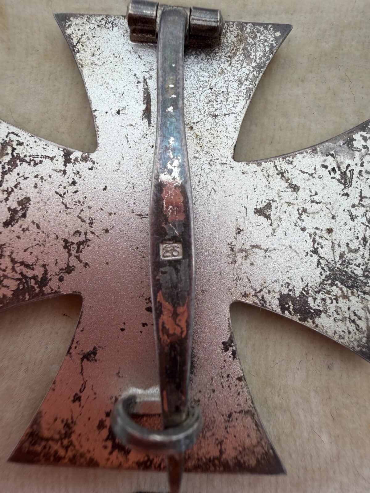 Close-up of the number 20 stamped on the reverse pin of an Iron Cross 1st Class