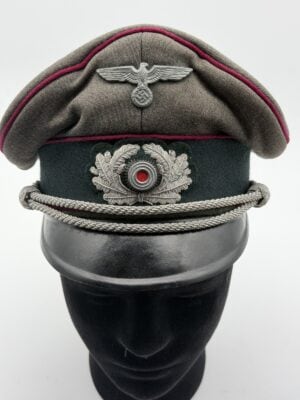 Heer Nebelwerfer officer visor cap with burgundy piping and silver chin cords
